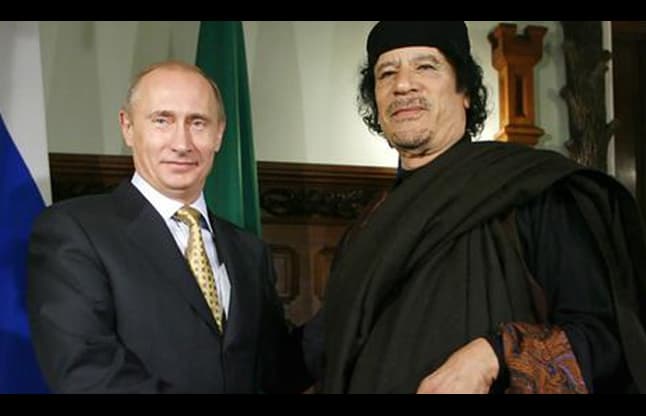 Muammar Gaddafi and Vladimir Putin