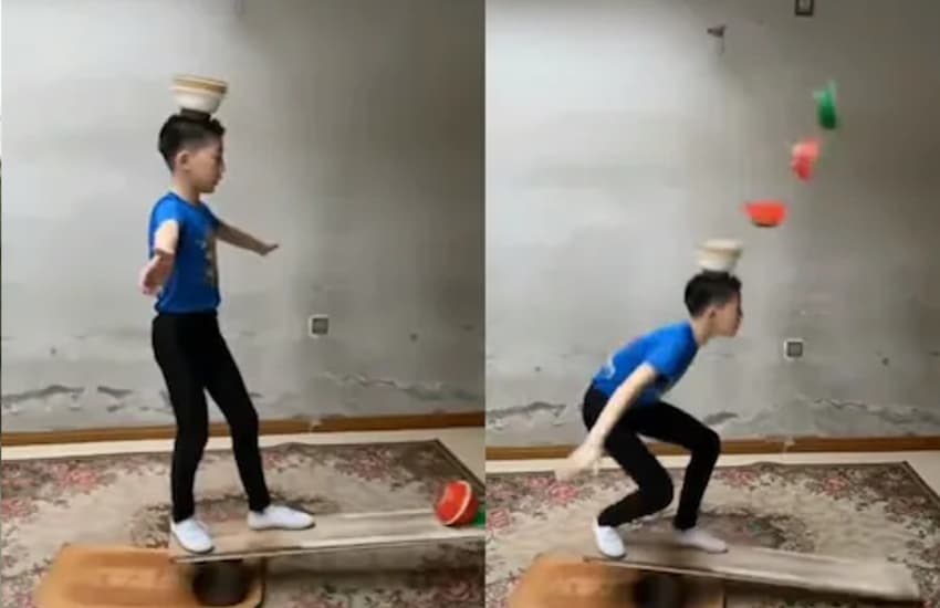 kid balance bowl on head