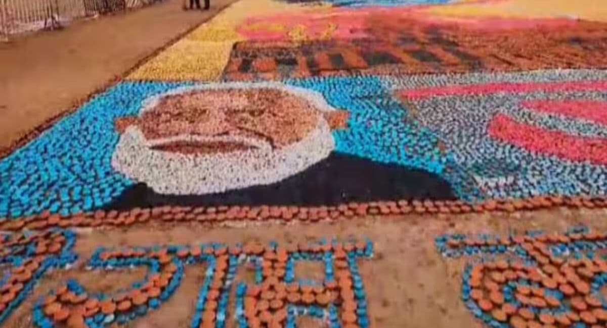 Ram temple made by 14 lakh lamps with picture of pm modi and cm yogi 