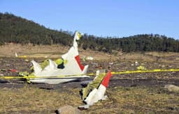 विमान के क्रैश हो जाने से 157 यात्रियों की मौत, देखें तस्वीरें