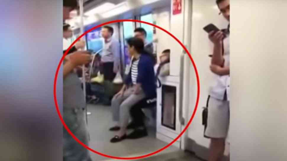woman sits in mans lap