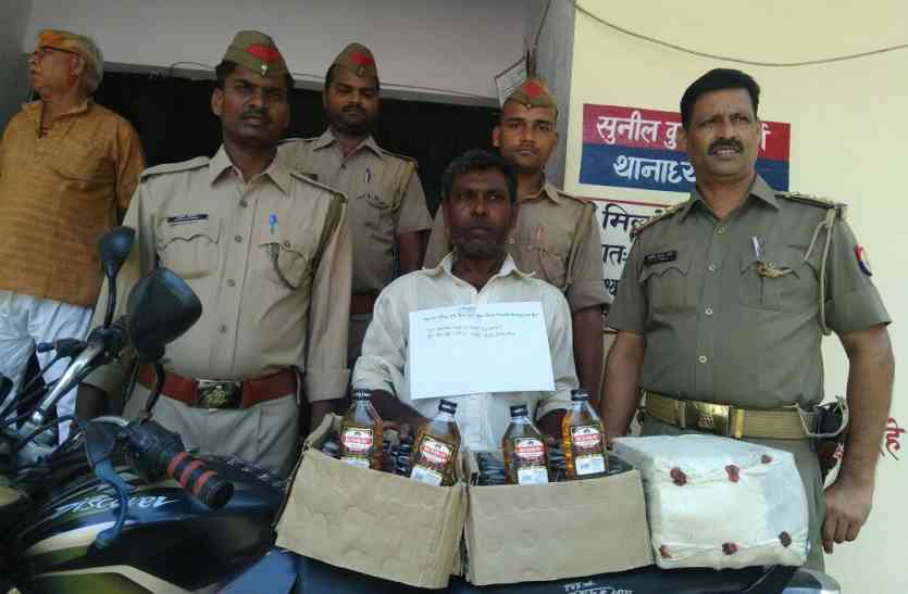 police मादक पदार्थ तस्कर गिरफ्तार, आजमगढ़ शराब कांड से जुड़ा तार