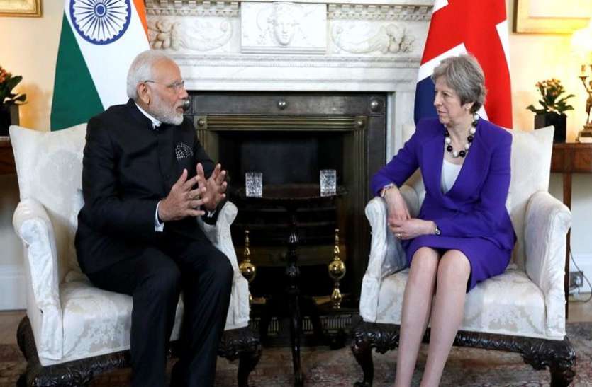 Modi May प्रधानमंत्री मोदी ने लंदन से खेला लिंगायत कार्ड, थेरेसा मे और प्रिंस चार्ल्स से भी हुई अहम मुलाकात