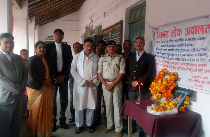 a लोक अदालत में हजारों प्रकरणों का निराकरण
