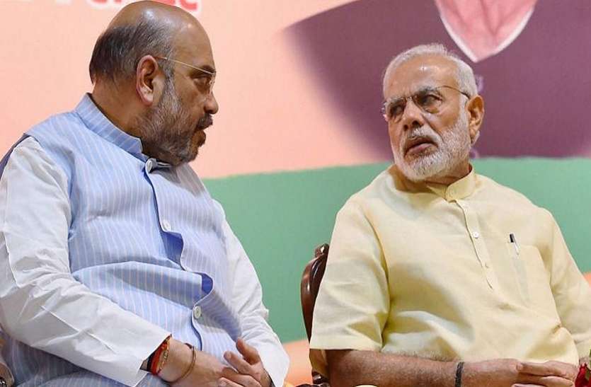 modi-shah गुजरात: मोदी-शाह के पोस्टर पर पोती कालिख, हार्दिक पटेल की पार्टी पर लगा आरोप