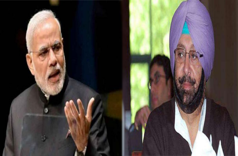 pm and punjab cm file photo गुरूनानक की 550 वीं जयंती समारोहों के मुद्ये पर केन्द्र और पंजाब सरकार के बीच पेंच