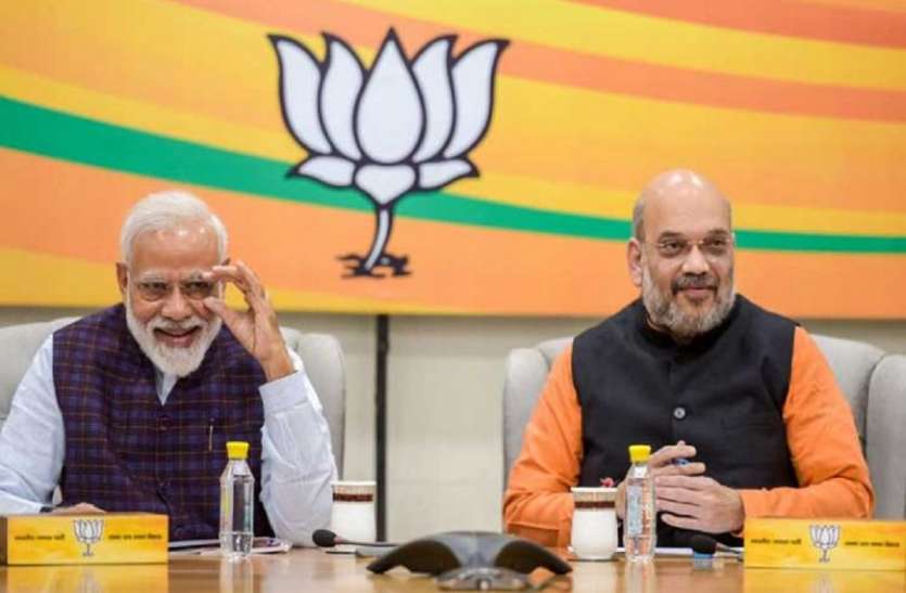 Narendra Modi Amit Shah BJP ने अखिलेश यादव के खिलाफ निरहुआ को दिया टिकट, लेकिन मछलीशहर से इन्हें बनाया प्रत्याशी