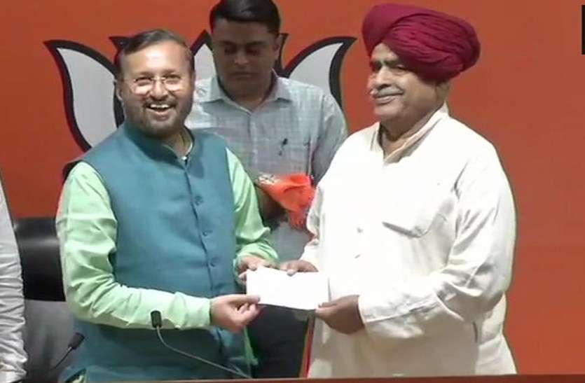 kirori lal bainsla joins bjp कर्नल किरोड़ी बैंसला ने फिर थामा BJP का दामन, बेटे के साथ ज्वाइन की पार्टी, कांग्रेस खेमे में हलचल