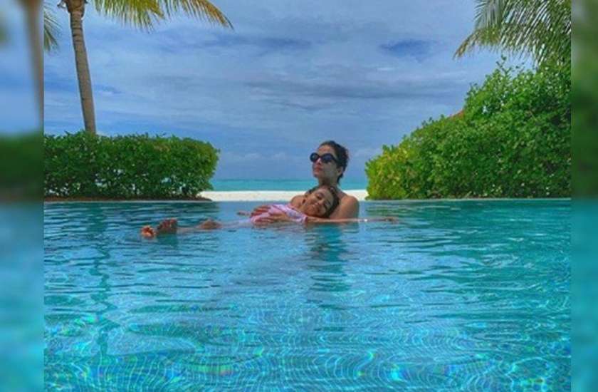 abhishek-bachchan-shares-pool-picture-of-aishwarya-rai-and-aaradhya