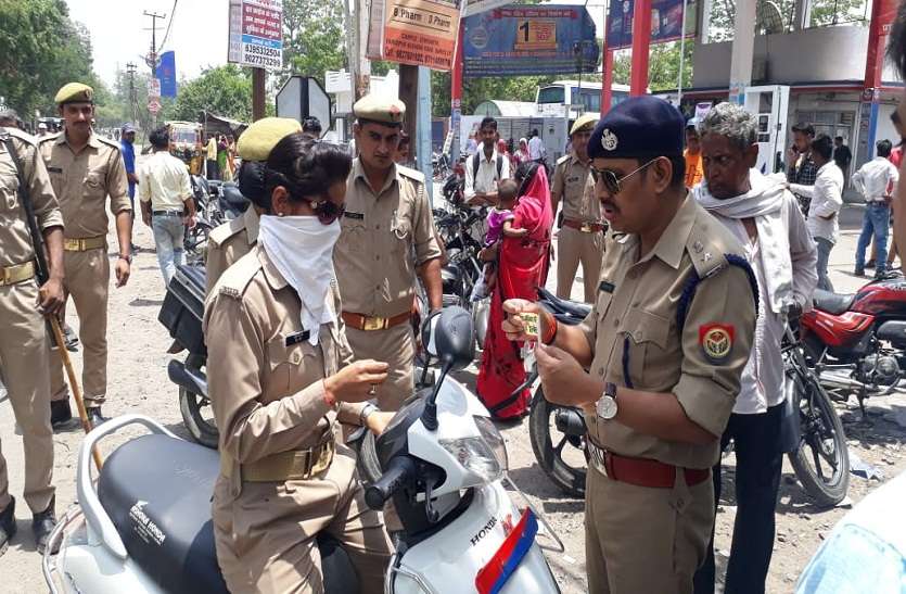 imposed sticker on the vehicles of those Without driving helmets