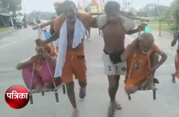 shravan of kalyug pappan and satendra carrying thier parents in kanwar Kanwar Yatra: माता-पिता को कांवड़ में बैठकर ले जा रहे कलयुग के 'श्रवण कुमार' की जमकर हो रही तारीफ, देखें वीडियो