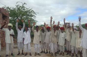 Angry villagers shouted protest Angry villagers shouted protest