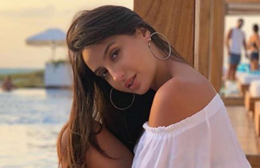 nora fatehi dance swimming pool, video goes viral on social media ...