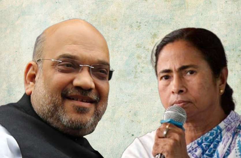 amit_mamta.jpg पश्चिम बंगाल से अमित शाह को मिला दुर्गा पूजा के उद्घाटन का न्यौता, TMC ने किया विरोध