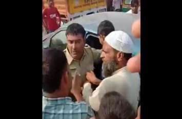 mob fight and marpit with Rajasthan police, video goes viral Breaking News: भीड़तंत्र ने पुलिस को बनाया शिकार, राजस्थान से दबिश देने आई पुलिस को जमकर पीटा