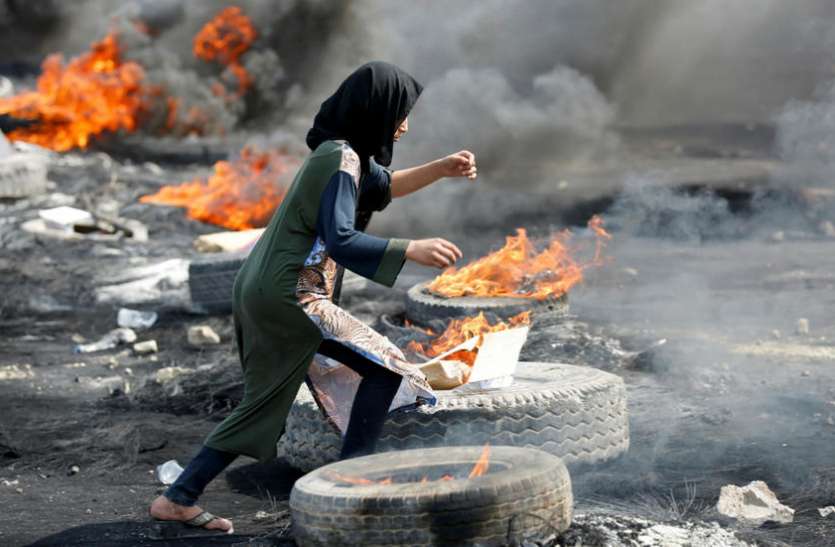 iraq protests इराकी प्रधानमंत्री ने दिया बगदाद से कर्फ्यू हटाने का आदेश, अभी भी प्रदर्शन जारी