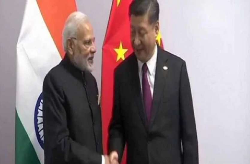 pm modi and jinping मोदी-शी की शिखर वार्ता से पहले, पुलिस हिरासत में 11 तिब्बती