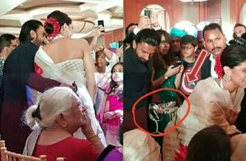 Ranveer Singh Carries Wife Deepika high heel sandals in his hands दीपिका के प्यार में पागल रणवीर सिंह जब शादी की पार्टी में हाथों में सेंडिल लेकर पहुचें , देखें तस्वीरें
