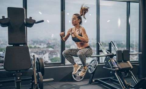 young-athletic-woman-exercising-jumps-in-a-health-royalty-free-image-1571323095.jpg