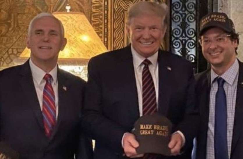 donald trump डोनाल्ड ट्रंप पर मंडराया कोरोना वायरस का खतरा, संक्रमित ब्राजील के अधिकारी से मिलाया हाथ