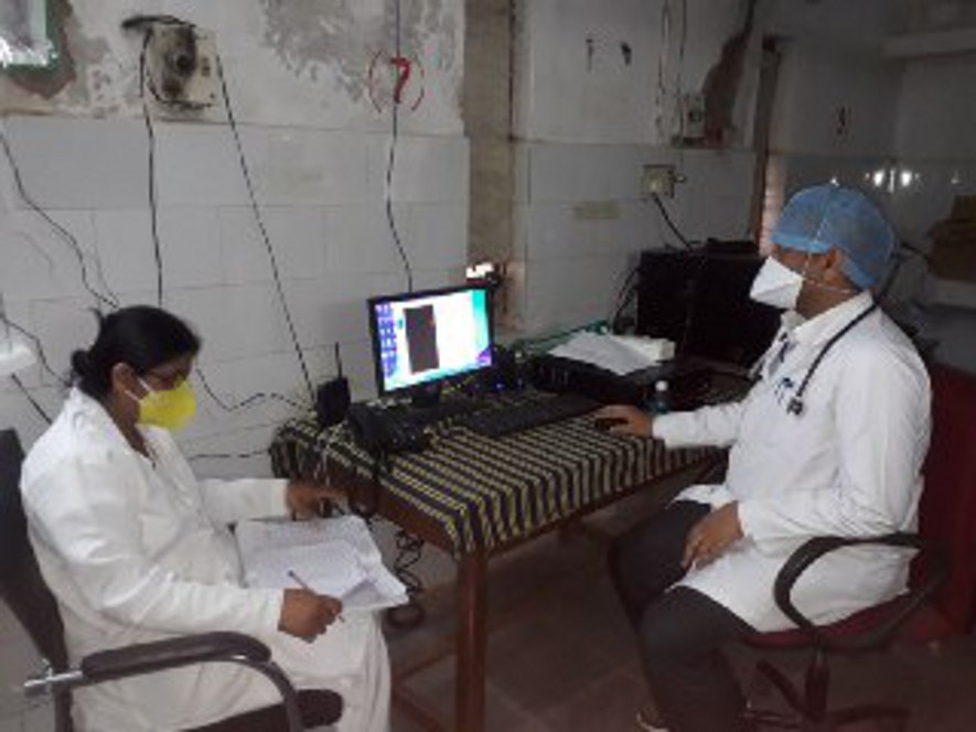 Doctors doing treatment through video calling at Tele Medicine Center