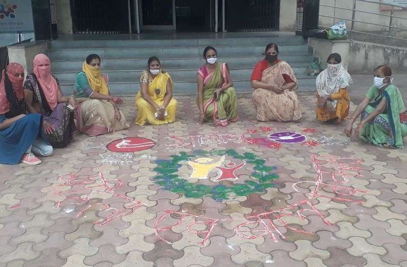 रंगोली से किया कोरोना बचाव के लिए जागरूक रंगोली से किया कोरोना बचाव के लिए जागरूक