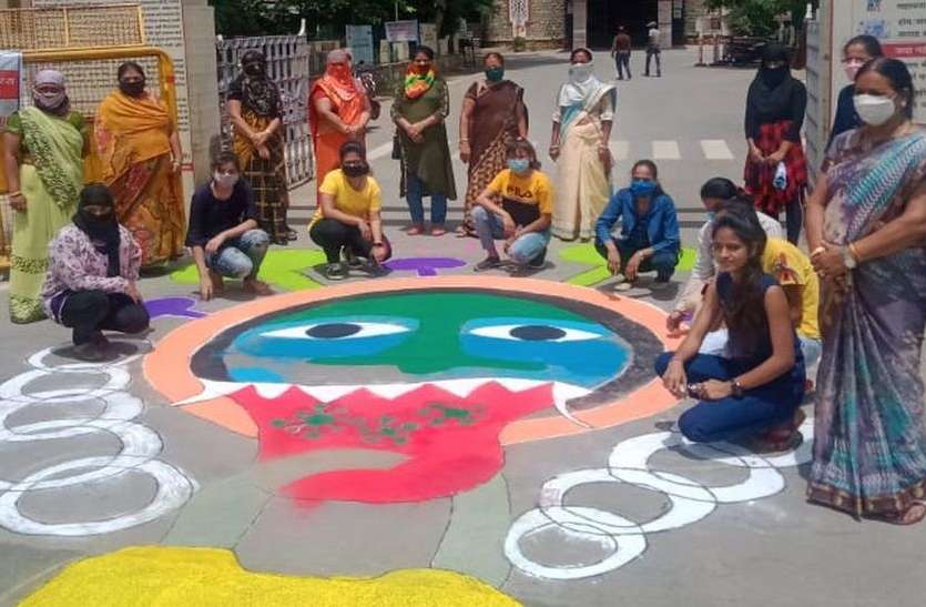 रंगोली के माध्यम से दिया जागरूकता संदेश रंगोली के माध्यम से दिया जागरूकता संदेश