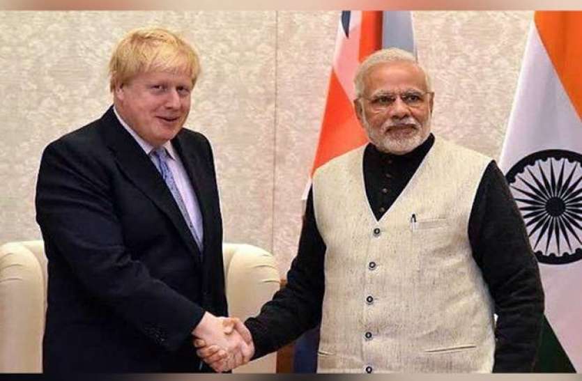 PM Modi and Boris Johnson UN महासभा में ब्रिटेन ने भारत को सराहा, कहा- कोरोना वायरस से लड़ने में दिया बड़ा योगदान