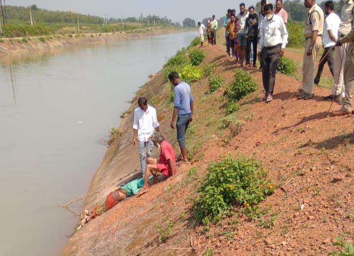 School teacher's dead body found in canal, son missing.jpg
