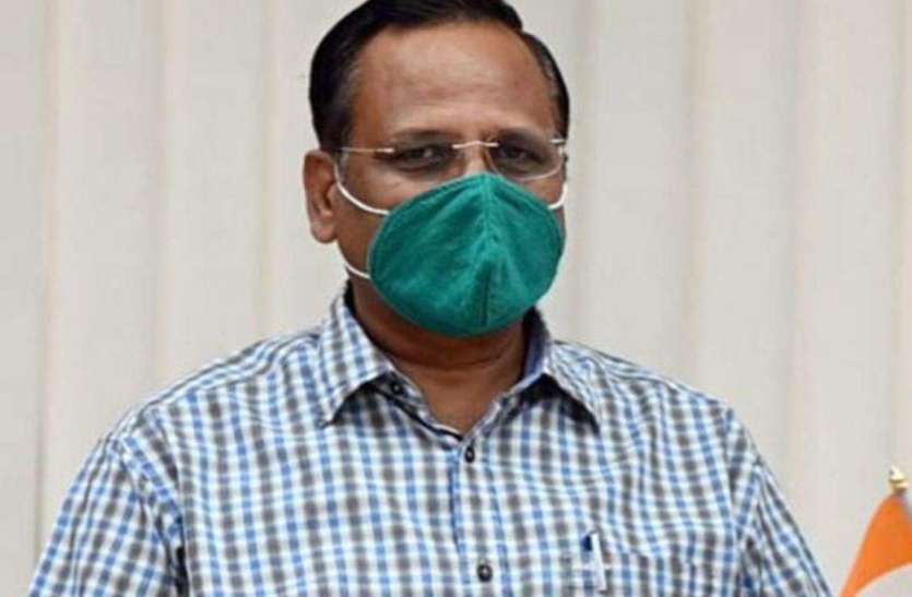 satendra jain दिल्ली के स्वास्थ्य मंत्री और आप कार्याकर्ता सड़कों पर उतरे, लोगों में मुफ्त मास्क बांटे