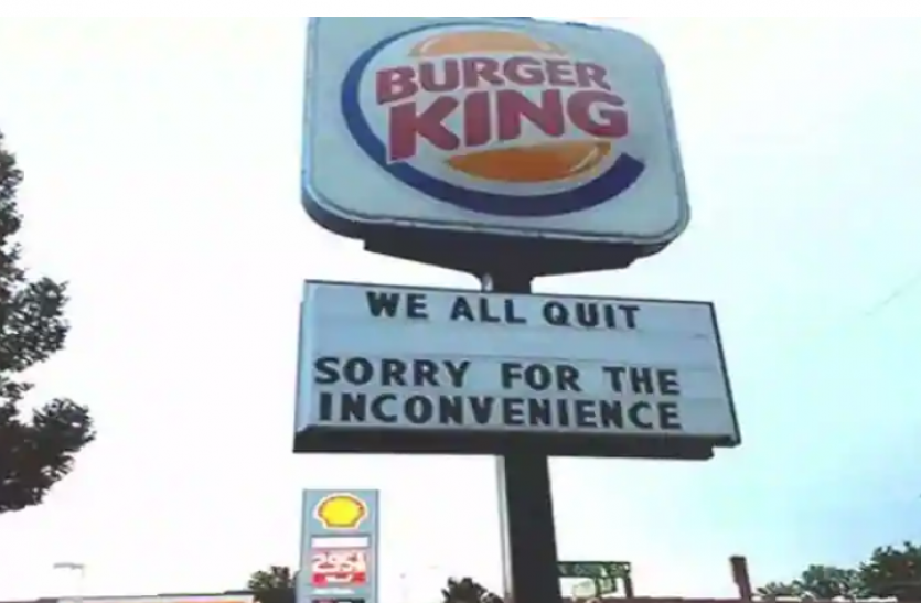 Burger Kings employees announce resignation at once with a sign We’re all quitting