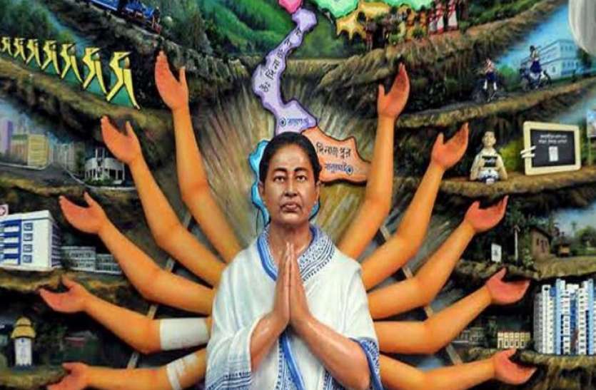 Durga Puja 2021 Durga Puja 2021: पंडाल में लगी ममता बनर्जी की मूर्ति, 10 हाथों में दिखीं विभिन्न योजनाएं
