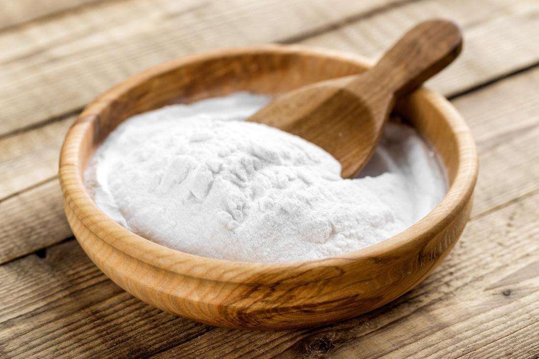 baking-soda-for-bath-in-wooden-bowl-with-wooden-spoon.jpg