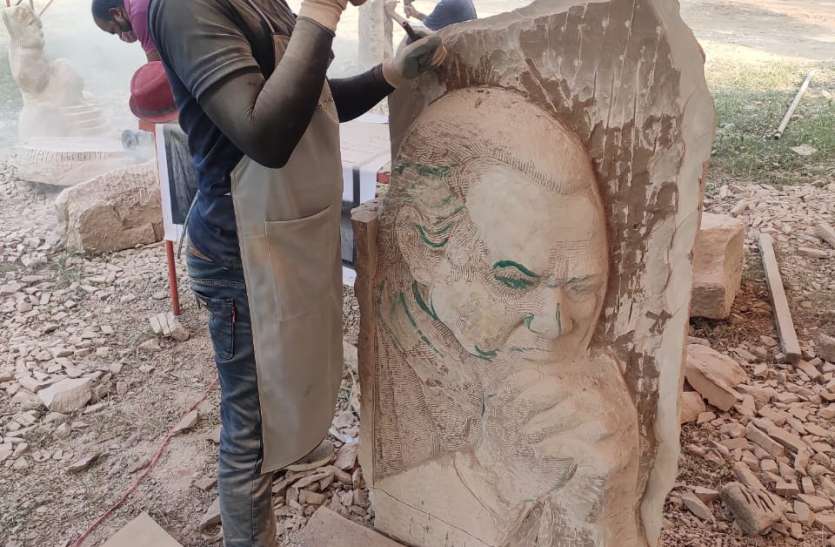 craftsmen shaping the rocks