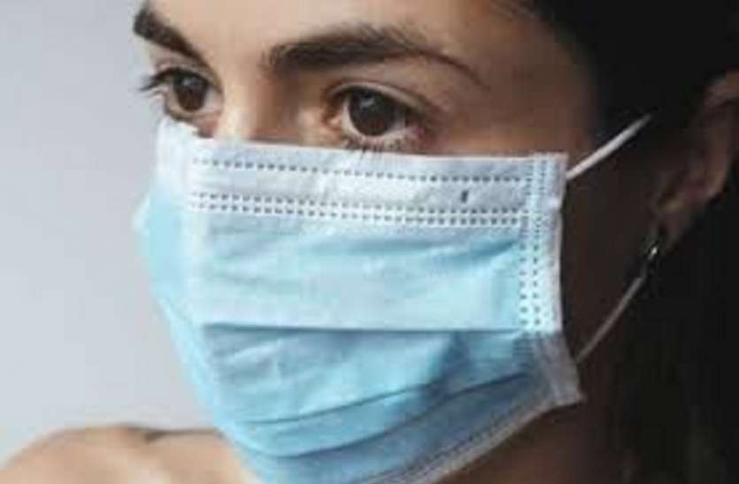 government says keep wearing masks until experts refusal टीकाकरण में भारत में हासिल किया 100 करोड़ का लक्ष्य, सरकार ने बताया कब तक पहनने हैं मास्क