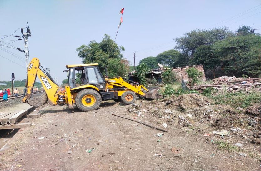 Illegal housing on the side of railway track broken with JCB