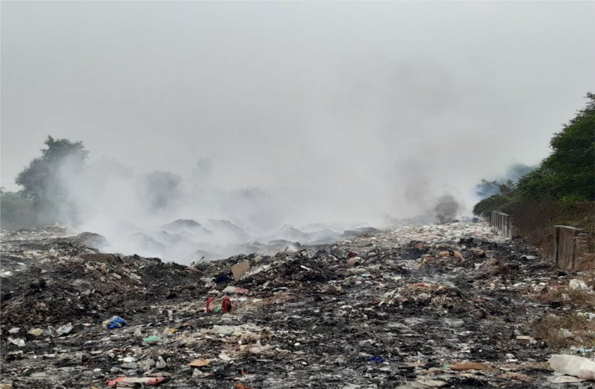 Fire in the garbage heaps, poisonous smoke spreading all around