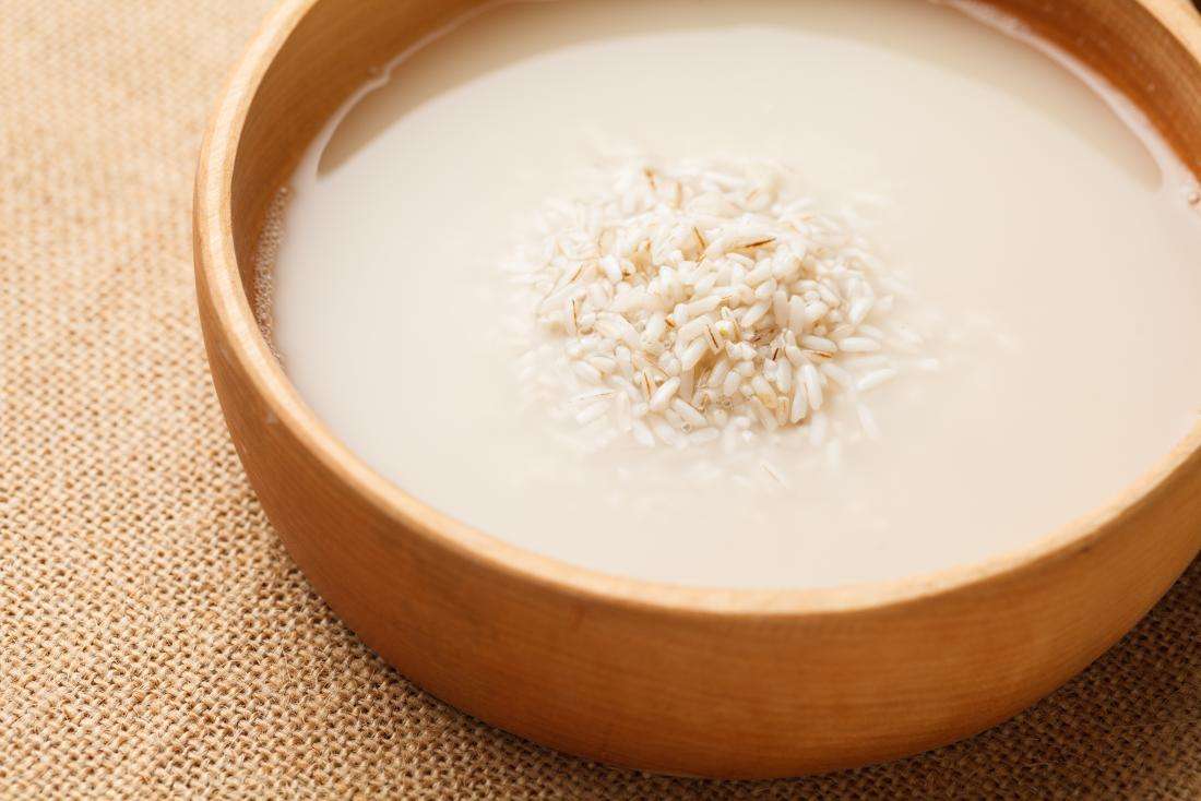 rice-and-rice-water-in-a-wooden-bowl.jpg