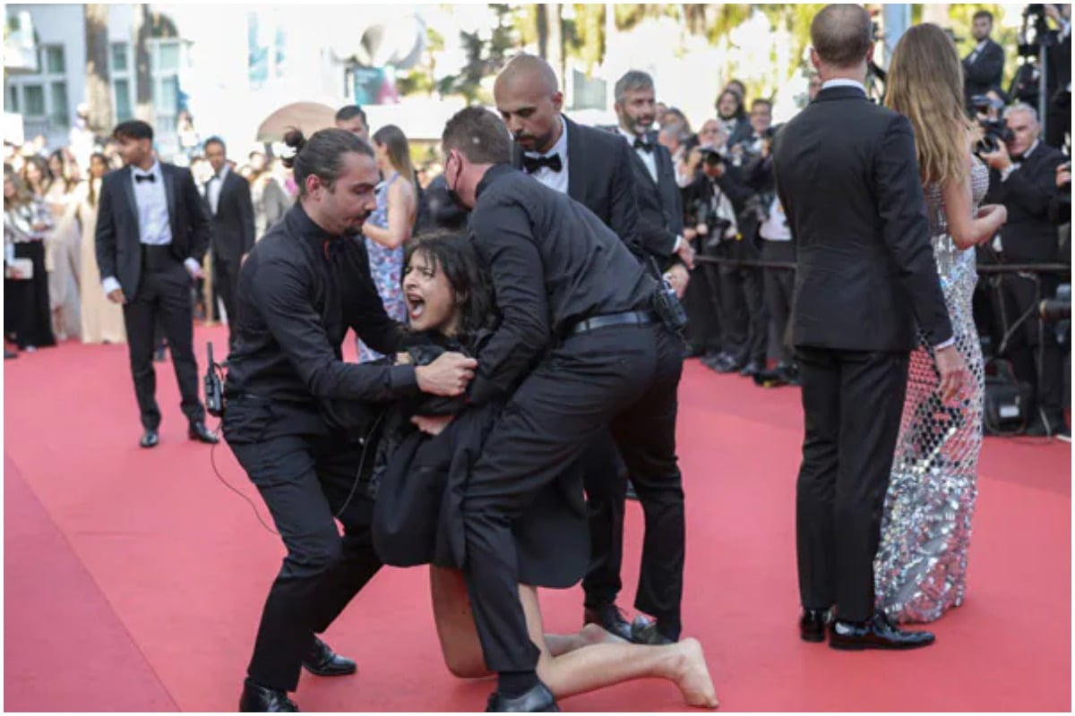 stop raping us topless woman ukraine protest on cannes red carpet