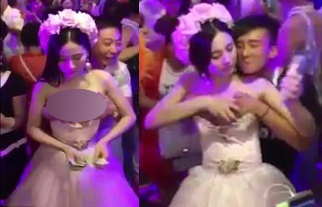 bride allowing guests touching breasts हनीमून के पैसे के लिए दुल्हन ने खुद ही करवा ली अपनी छेड़खानी,वीडियो हुआ वायरल