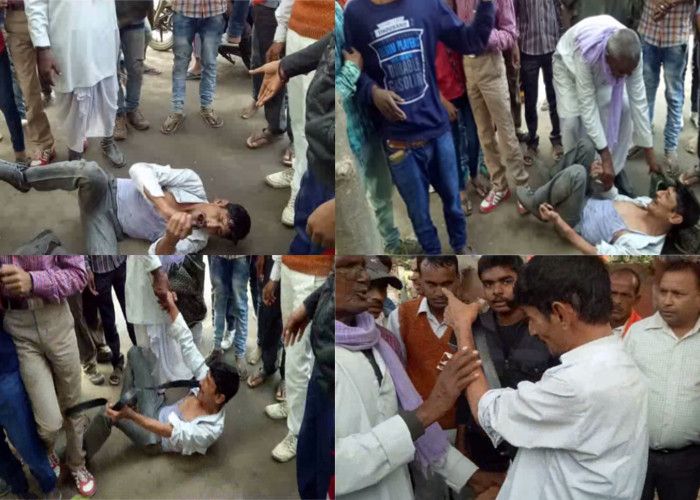 barabanki पेड़ से बांधकर लोगों ने बेल्ट से की जेबकतरे की पिटाई, देखें LIVE वीडियो