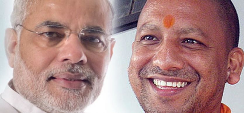 Narendra Modi and Yogi adityanath पीएम मोदी के गढ़ में विकास योजनाओं का सच जानेंगे सीएम योगी आदित्यनाथ