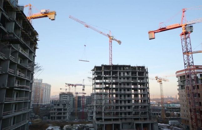 multi story flat construction real estate जीएसटी से महंगा हो जाएगा फ्लैट का मेंटीनेंस चार्ज